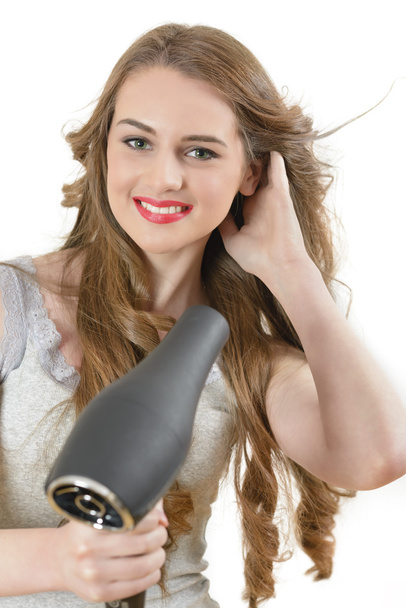 Woman using Hairdryer - Foto, Imagem