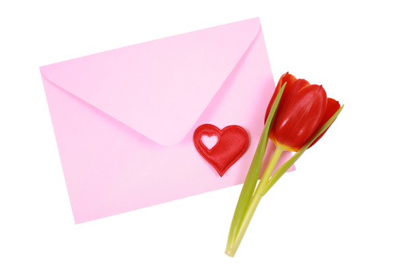 pink envelope with red heart and tulip isolated on white - Fotó, kép
