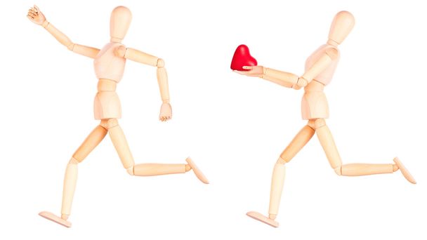 Wooden Dummy holding red heart - Foto, immagini