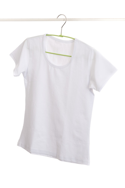 white t-shirt on hanger. - 写真・画像
