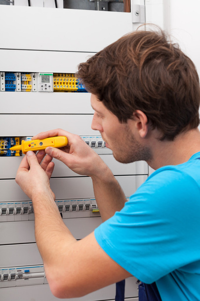 Handyman checking voltage - Photo, image