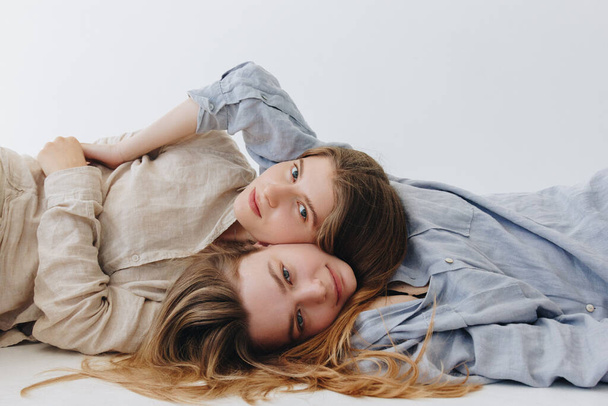 Minimalistic Fashion Portrait Of Two Girls On White Background - Photo, Image