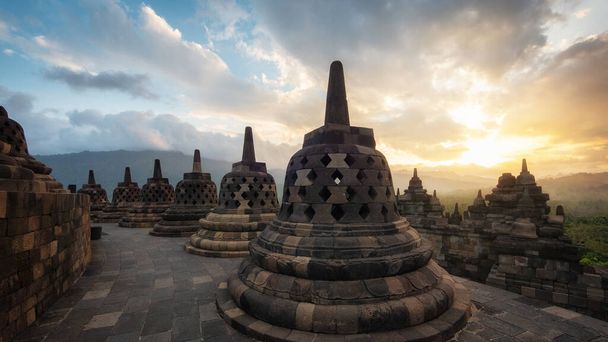 Ancient ruins of Borobudur, a 9th-century Mahayana Buddhist temple in Magelang Regency near Yogyakarta in Central Java, Indonesia. - Photo, Image