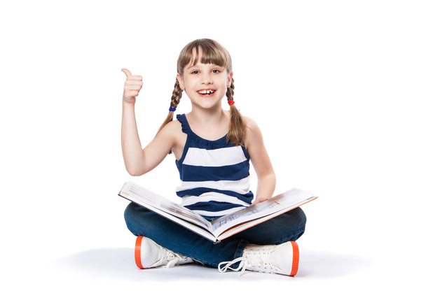 girl reading a book on white background - Foto, imagen