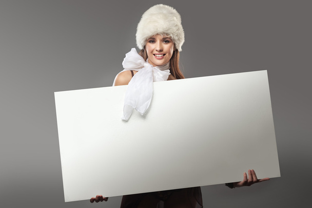 Young happy woman over white board - Zdjęcie, obraz