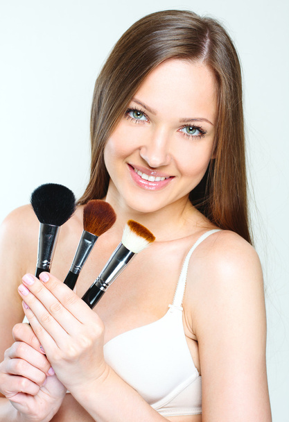 Beautiful woman making makeup - Foto, immagini