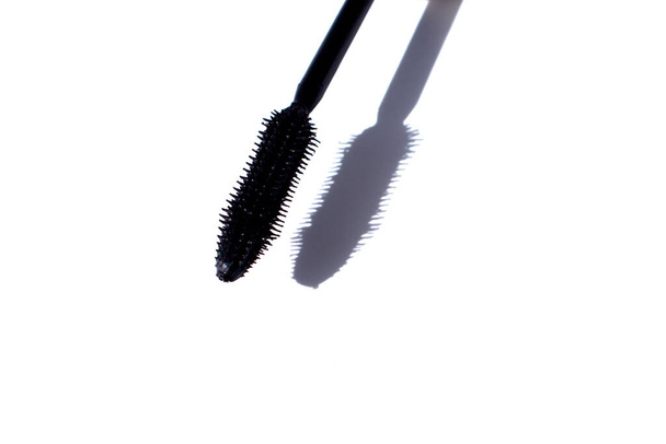 a brush of voluminous mascara on a white background. - Photo, Image