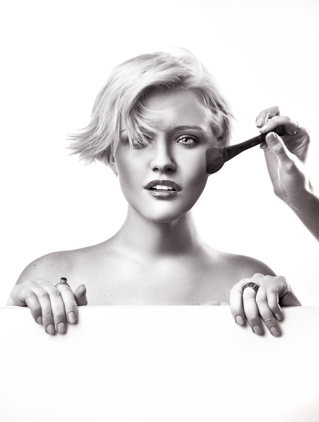 Portrait of a woman doing make up - Fotó, kép