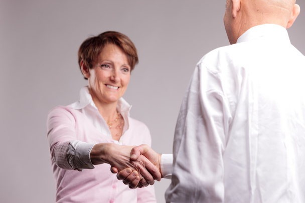 successful senior woman handshaking - Photo, Image