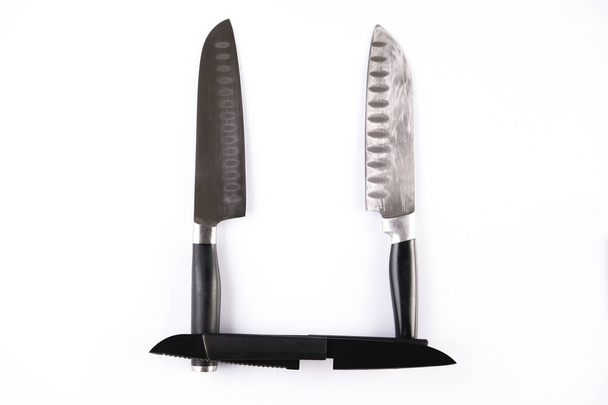 Алфавіт з ножів ізольовано на білому тлі. Лист "U" з професійних кухонних ножів. Концептуальний шрифт
 - Фото, зображення