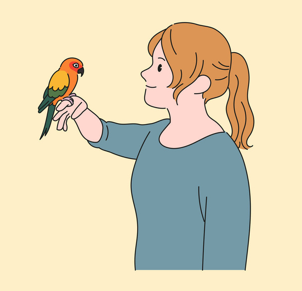 Een meisje doet papegaai op haar hand en kijkt liefdevol. handgetekende stijl vector ontwerp illustraties. - Vector, afbeelding