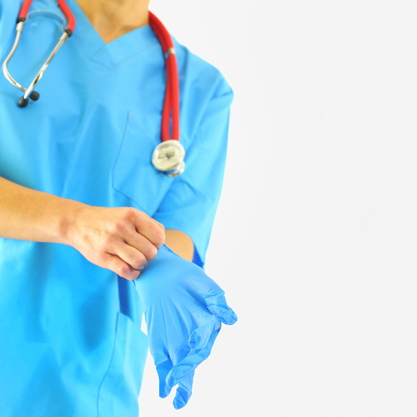 Médecin portant des gants médicaux - Photo, image
