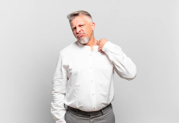 senior businessman feeling stressed, anxious, tired and frustrated, pulling shirt neck, looking frustrated with problem - Photo, Image