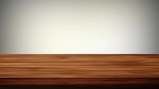 Tavolo da tavolo in legno vuoto davanti allo sfondo arancione chiaro. Effetto luce e perdite. Video HD - Filmati, video