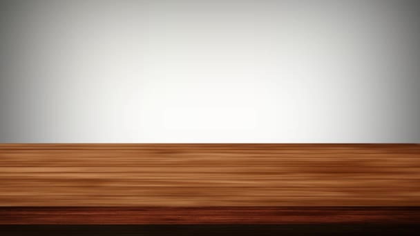 Tyhjä puinen pöytä harmaan taustan edessä. Kevyt ja vuotava vaikutus. HD-kuvamateriaalia - Materiaali, video