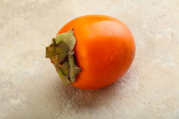 Ripe sweet and tasty persimmon fruit - Photo, Image
