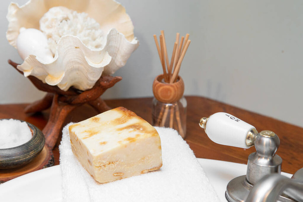 Natural personal care items on a wooden bathroom counter - Photo, Image