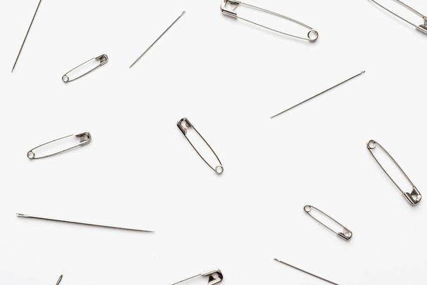 pins with needles on a white background  - Foto, Imagem