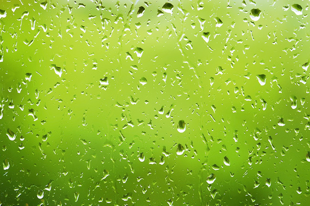 краплі води на склі
 - Фото, зображення
