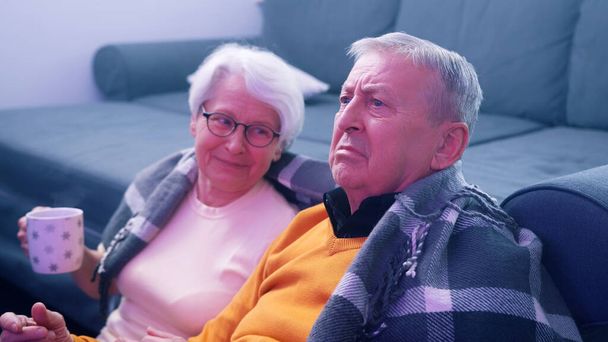 Shocked retired couple watching tv. Bad news - Photo, Image