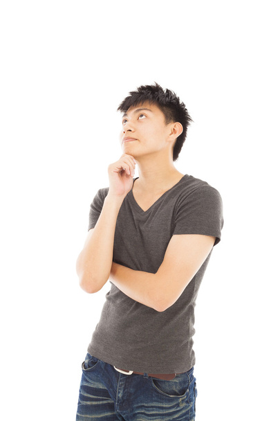 jeune homme pensant ou doutant sur un fond blanc
 - Photo, image