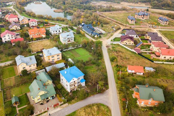 Aerial view of home roofs in residential rural neighborhood area. - Photo, Image