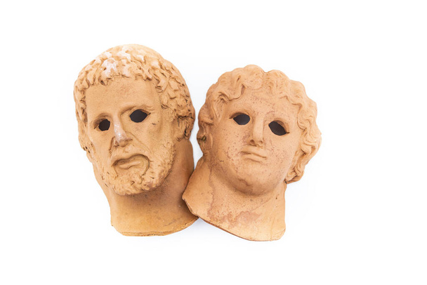 heads of jupiter and saturn made of clay. - Photo, Image
