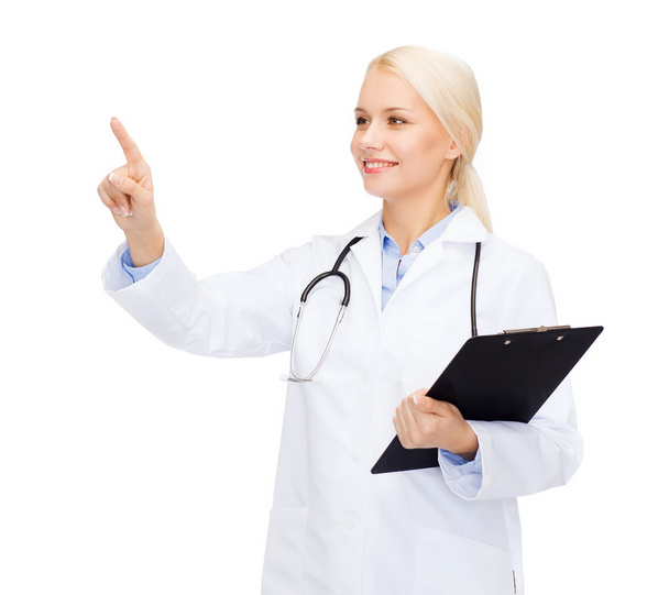 Smiling female doctor pointing to something - 写真・画像