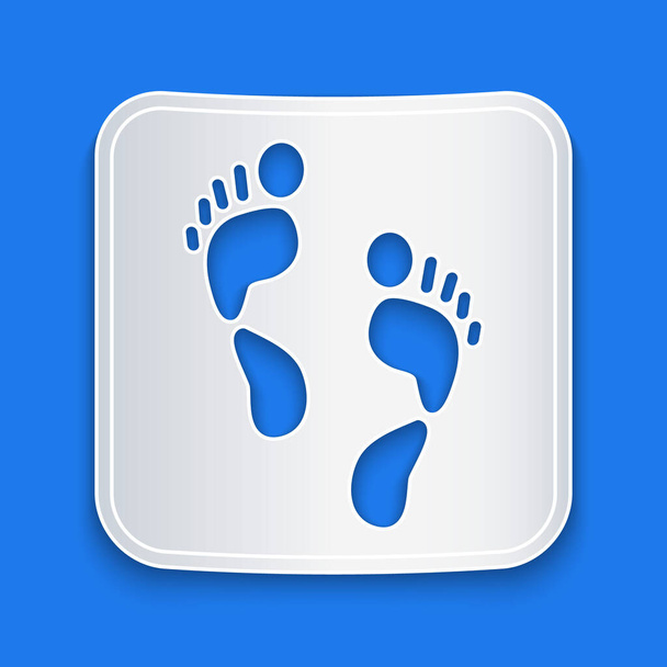 Papiergeschnittenes Symbol für den menschlichen Fußabdruck isoliert auf blauem Hintergrund. Spuren des menschlichen Fußes. Papierkunst. Vektor. - Vektor, Bild