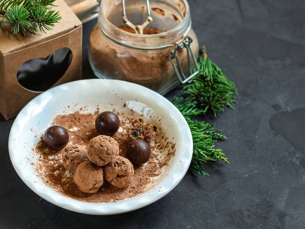 close-up view of delicious homemade chocolate truffles on table - Valokuva, kuva