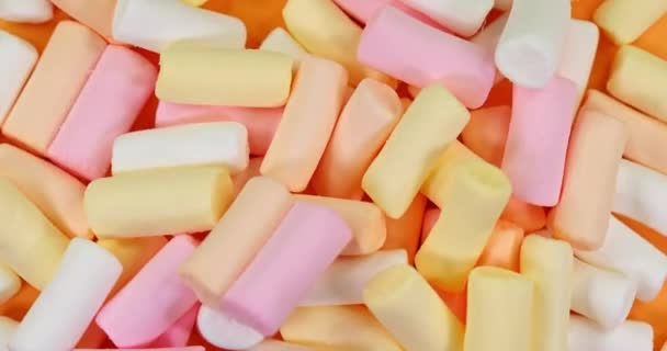marshmallow multicolored rotate. Sweets super slow motion. - Footage, Video