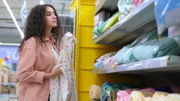 shopping in department with home textiles in hypermarket - Footage, Video