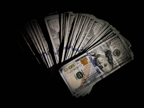 100 долларов в темноте, USD 100 - Фото, изображение