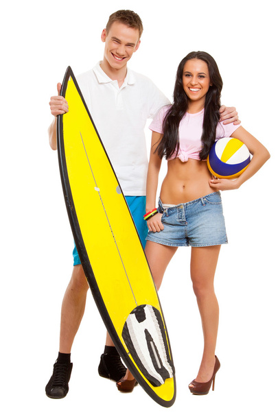 Femme et homme posant avec une planche de surf
 - Photo, image