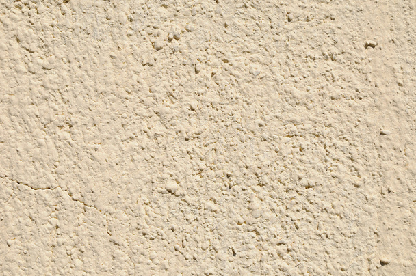 painted wall with beige drop texture - Foto, Bild