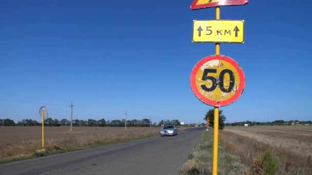 Looking on the speed limit road signs with car moving on the background - Footage, Video