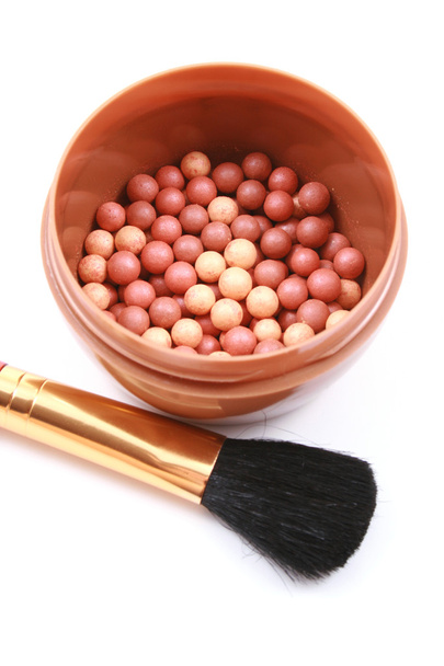beauty treatment - box of bronzing pearls isolated on white - 写真・画像