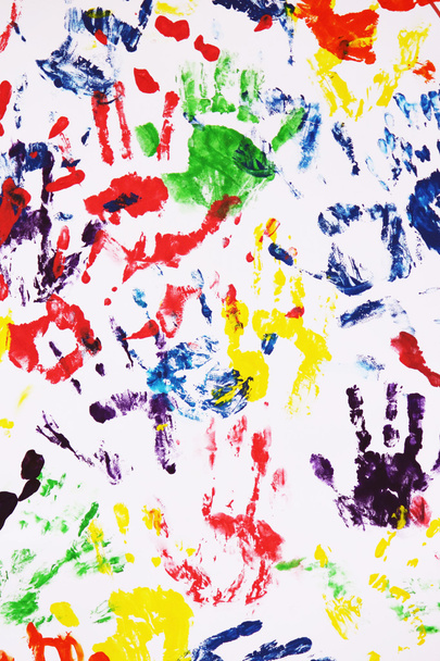colorful handprints on the white background - Фото, изображение