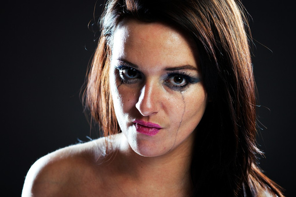Angry and hurt woman crying, smeared make up - Fotografie, Obrázek