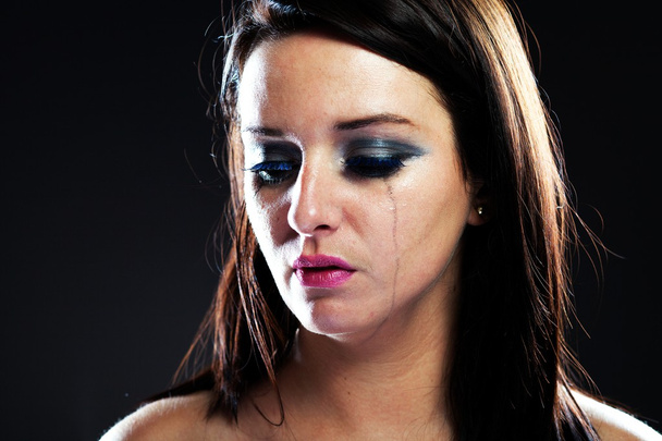 Hurt woman crying, smeared makeup - Foto, imagen
