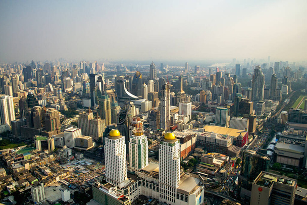 Bangkok, Thailand - January 19,2019 : high angle view of urban skyline in heart of Bangkok view from Baiyoke Sky Tower formerly highest building in Thailand - Photo, Image