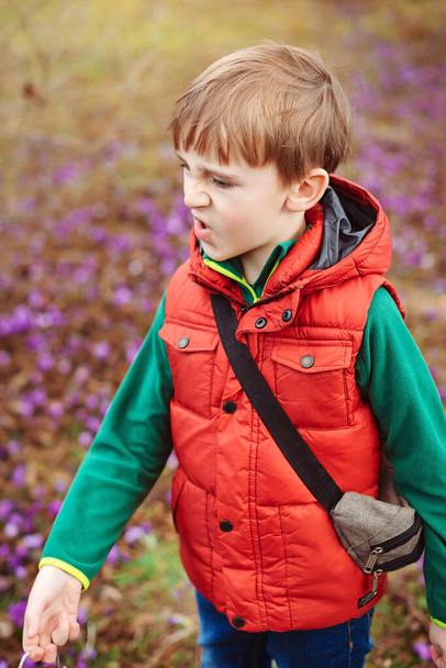 Child behaving bad on a walk. Kids tantrums, childhood and lifestyle concept - Photo, Image