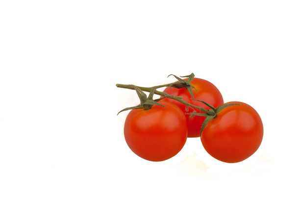 Três tomates cereja
 - Foto, Imagem