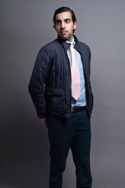 Contemporary fashion man wearing blue jacket and pink tie. Black - Photo, Image