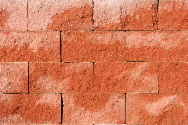 Texture - a wall of rough rectangular red stones. - Photo, Image