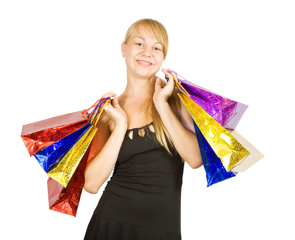 Happy girl holding shopping bags - Valokuva, kuva