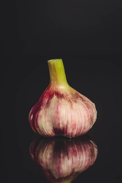 garlic on black background - Photo, Image
