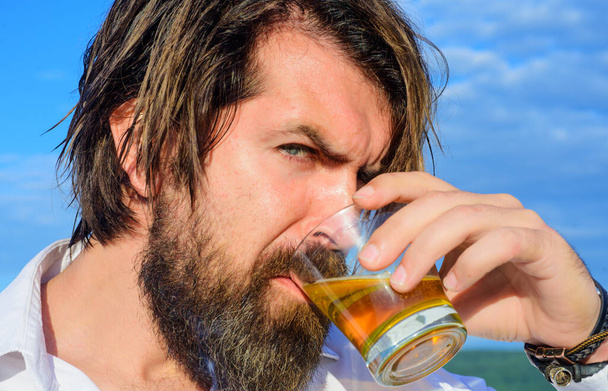 Tasting and degustation. Bearded man drinking cognac. Handsome Man with glass of brandy. - Fotografie, Obrázek