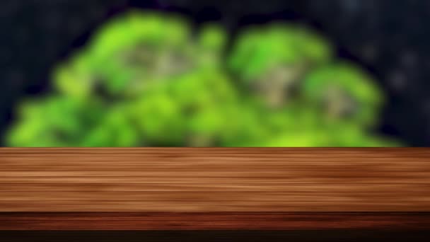 Barra de mesa de madera y la montaña verde borrosa en el fondo negro. Efectos de luz y fugas. HD de imágenes - Imágenes, Vídeo