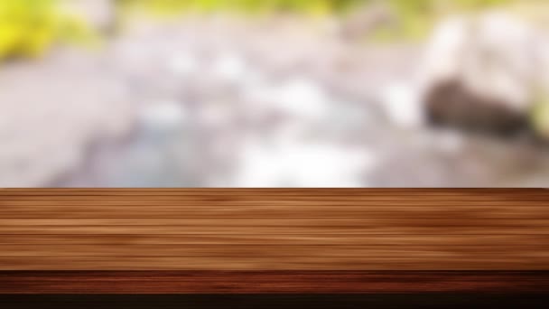 Wood table bar and blurred water and grass background. Light and leak effect. HD footage - Footage, Video